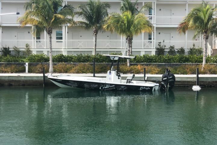 a boat parked next to a body of water