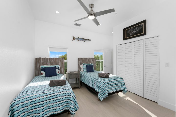 a bedroom with a bed in a room