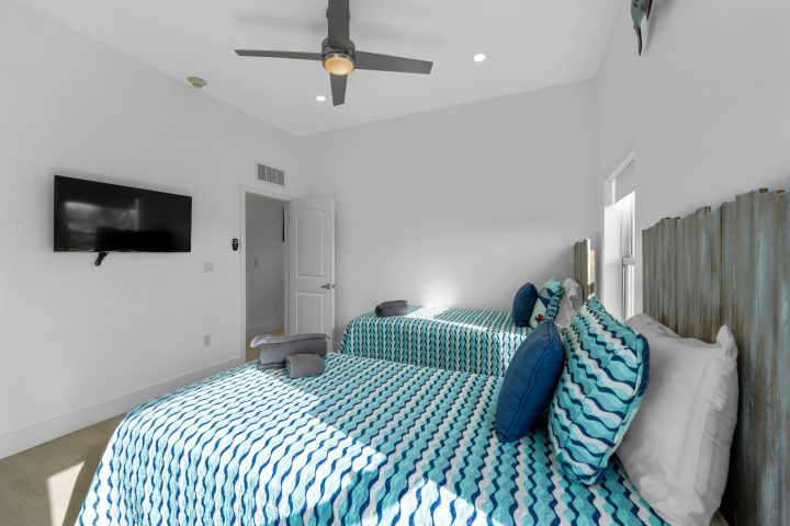 a bedroom with a bed in a room