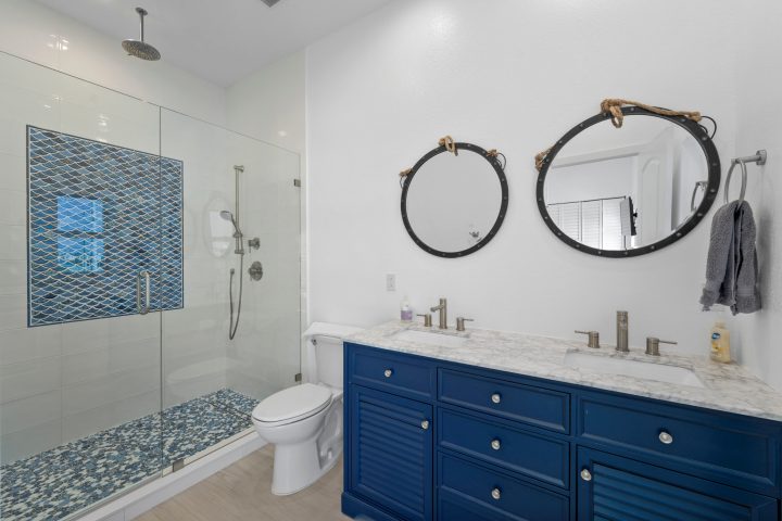 a room with a sink and a mirror