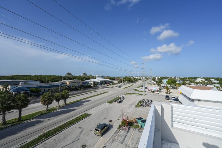 a train is parked on the side of a road