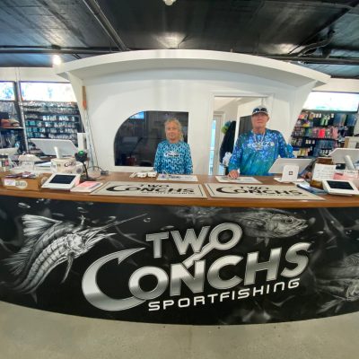 a stack of flyers on a table