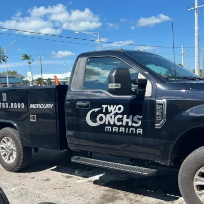 a car parked on the side of a truck